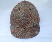 Paisley print 6 panel cap, 1910 short visor with supple leather sweatband.