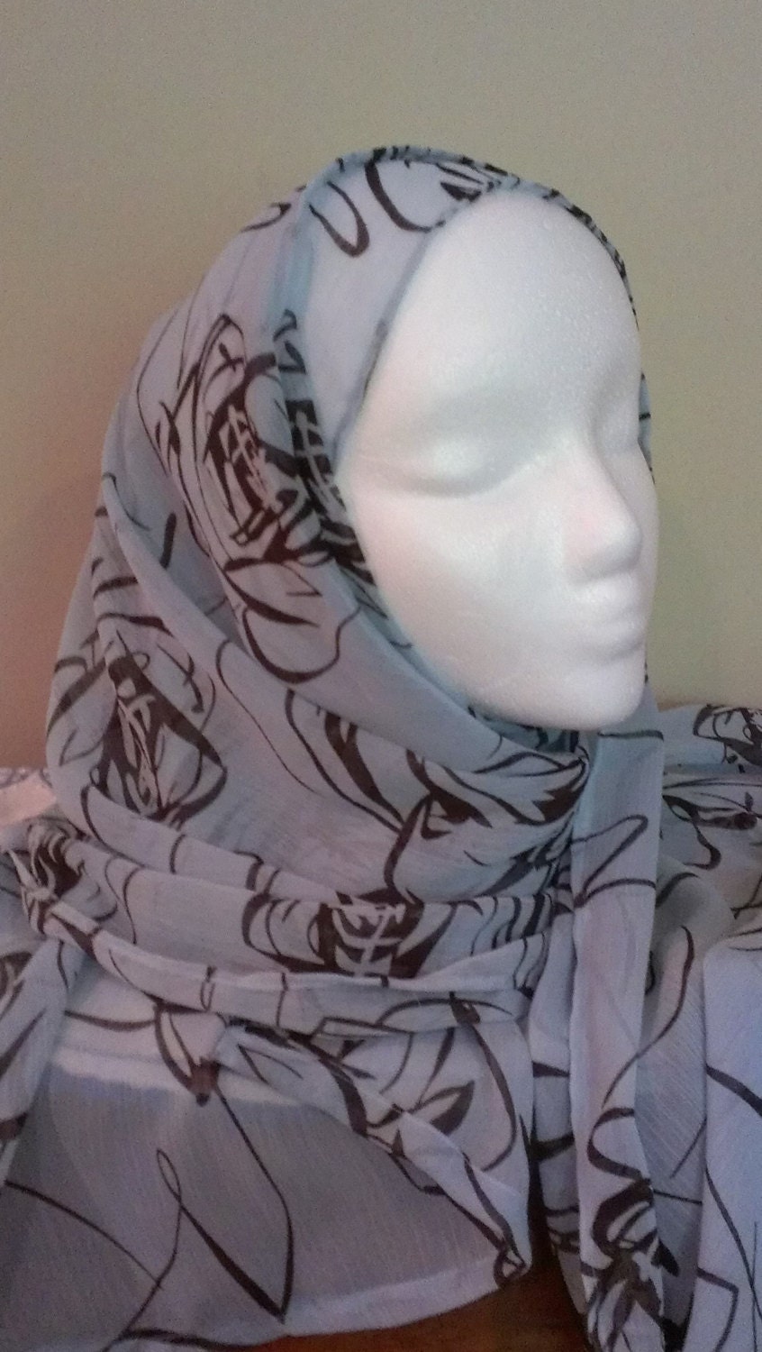 Elegant soft poly chiffon scarf in cool baby blue with black sketched roses.