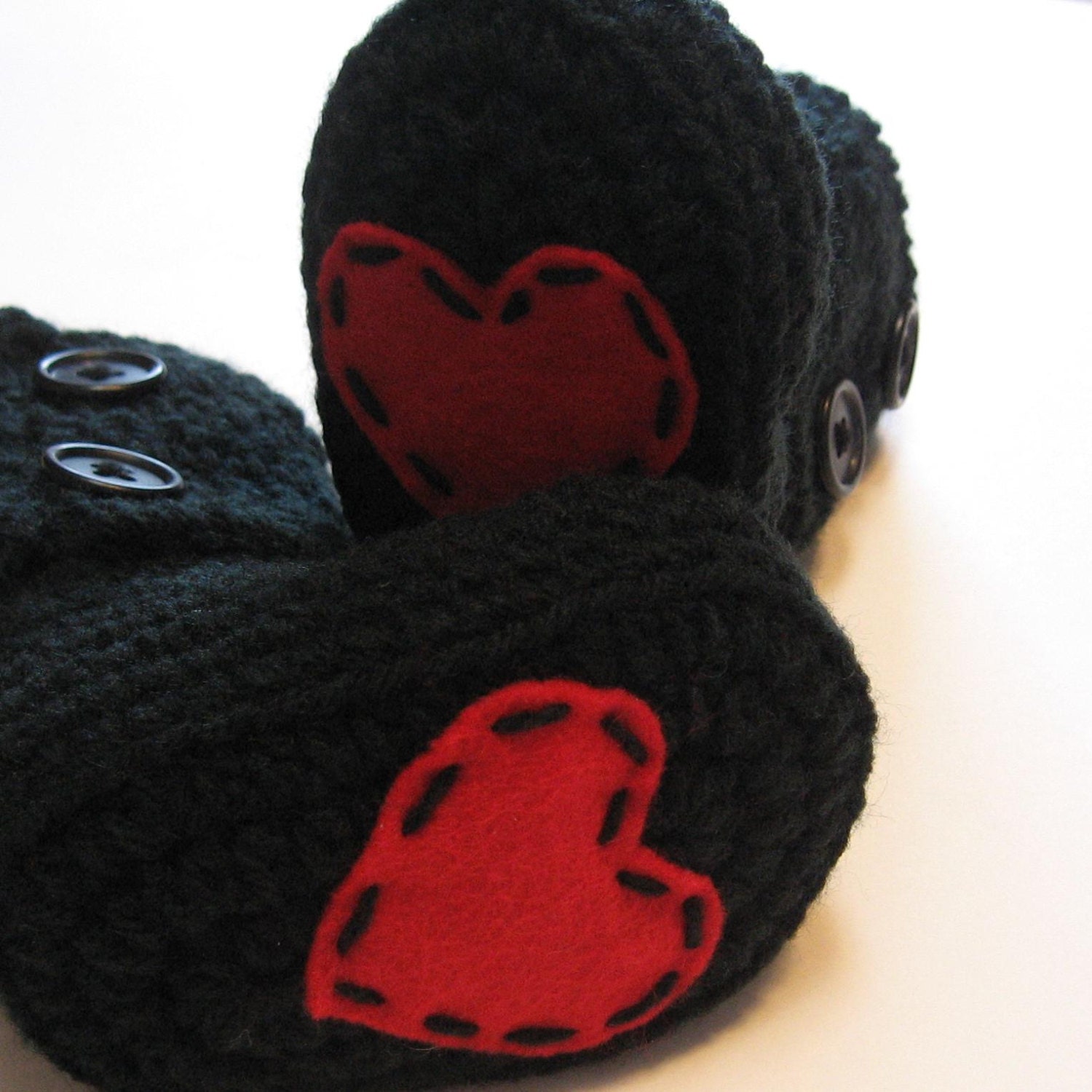 Valentine's day booties.  Toddler sizes.  6 to 12 month, 12 month, 18 month, 24 month.  Black booties with hearts.