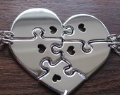 Heart shaped jigsaw puzzles with hearts pendants necklaces