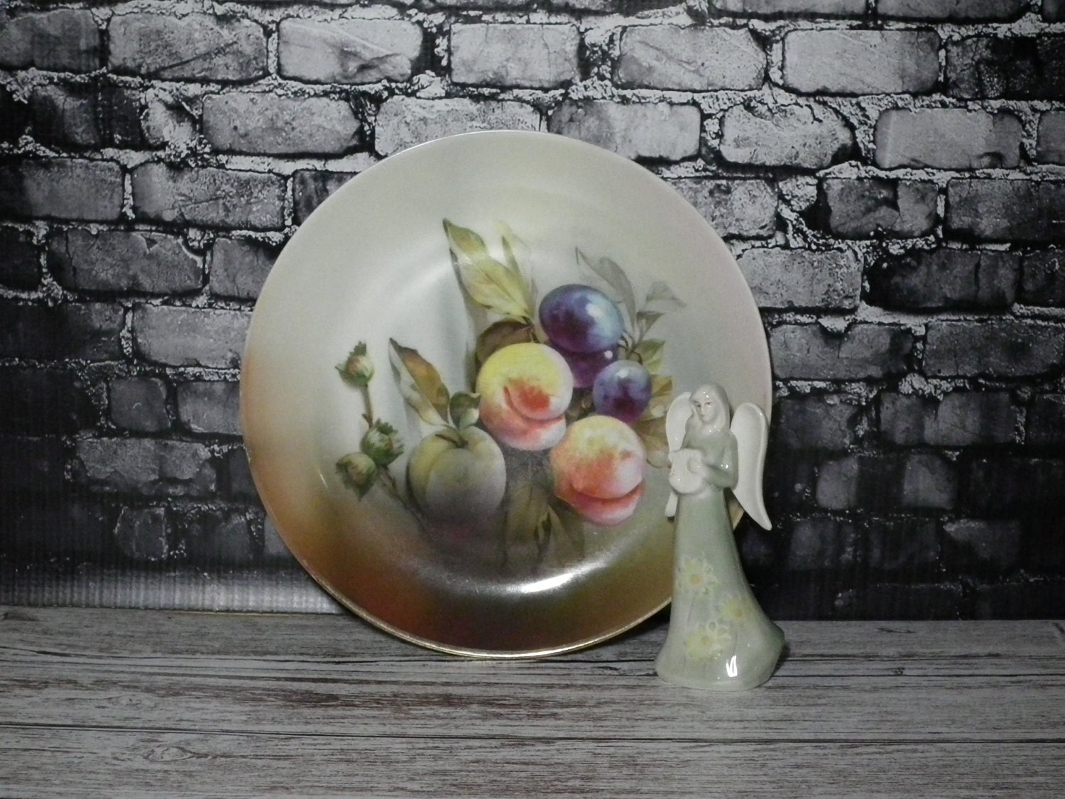 Handpainted plate with peaches and grapes marked J & C