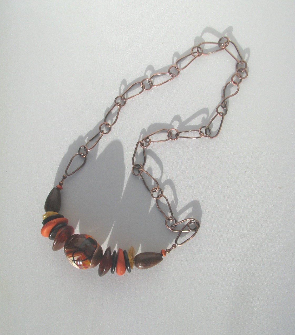 A Handcrafted 24" Copper Necklace Featuring An Italian Glass Bead and Wood, Amber, Resin and Vintage German Beads - Natural - Organic