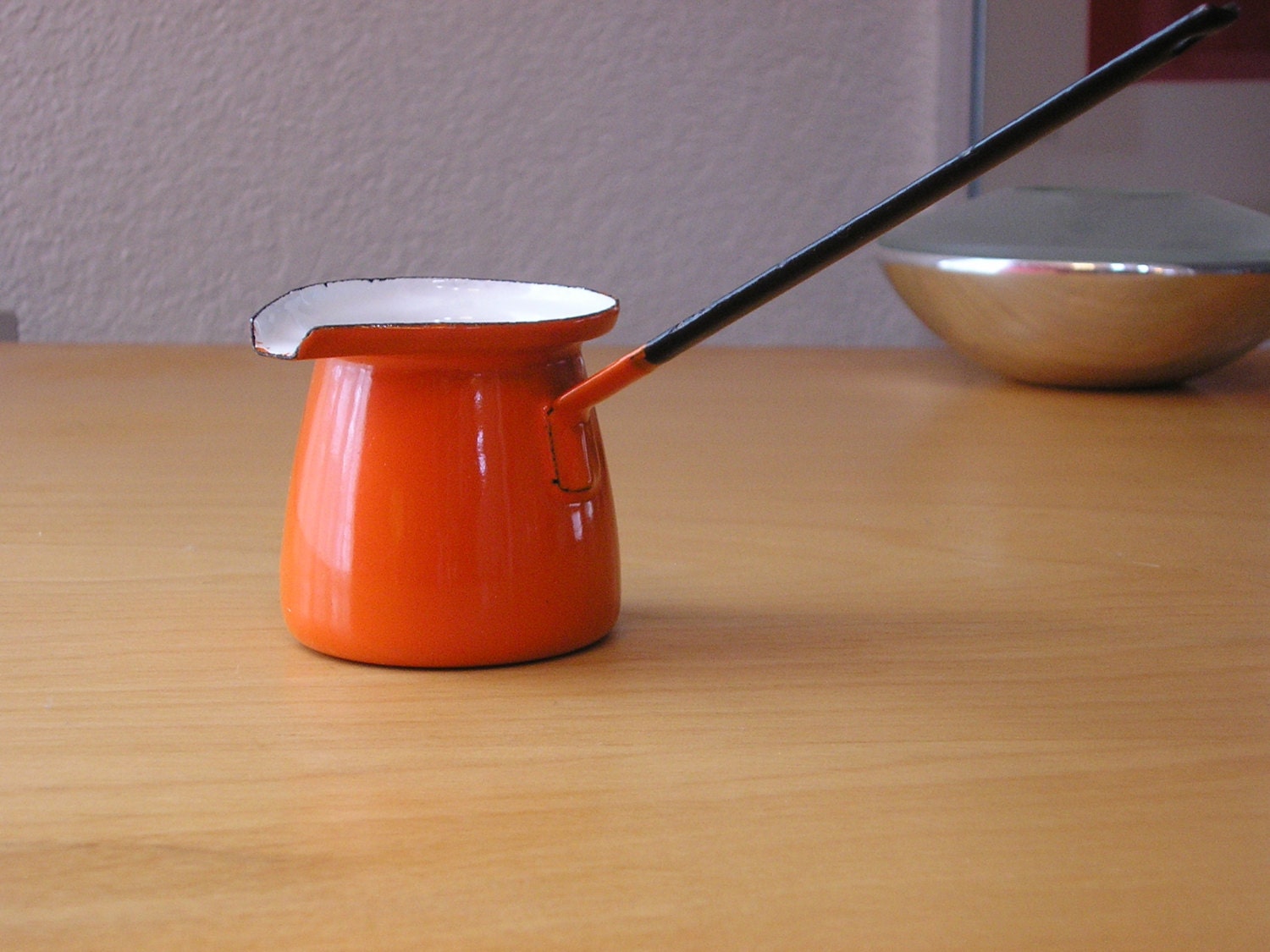 Small bright orange espresso pot from Poland