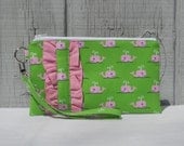 Clutch wristlet with ruffle accent, green and pink whales