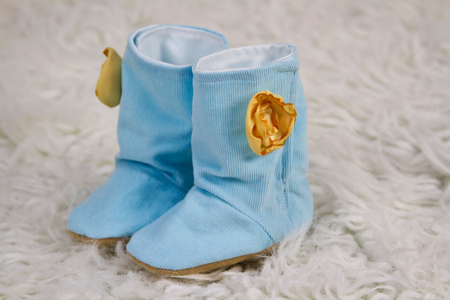On Sale -Boots for Infants with flowers or buttons - Comes in different colors - Sizes from 0 - 24 months