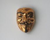 Guy Fawkes Mask Brooch, Gold Luster Over Black Glaze, Occupy Your Lapel