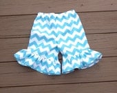 Girls ruffle knee shorts, capris, or pants.  Aqua white or any color chevron. Custom boutique children's clothing by EverythingSorella.