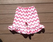 Girls ruffle knee shorts, capris, or pants.  Pink white or any color chevron. Custom boutique children's clothing by EverythingSorella.
