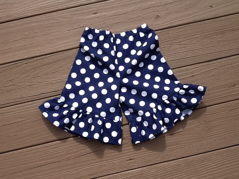 Girls ruffle knee shorts, capris, or pants. Navy white or any color polka dot. Custom boutique children's clothing by EverythingSorella.