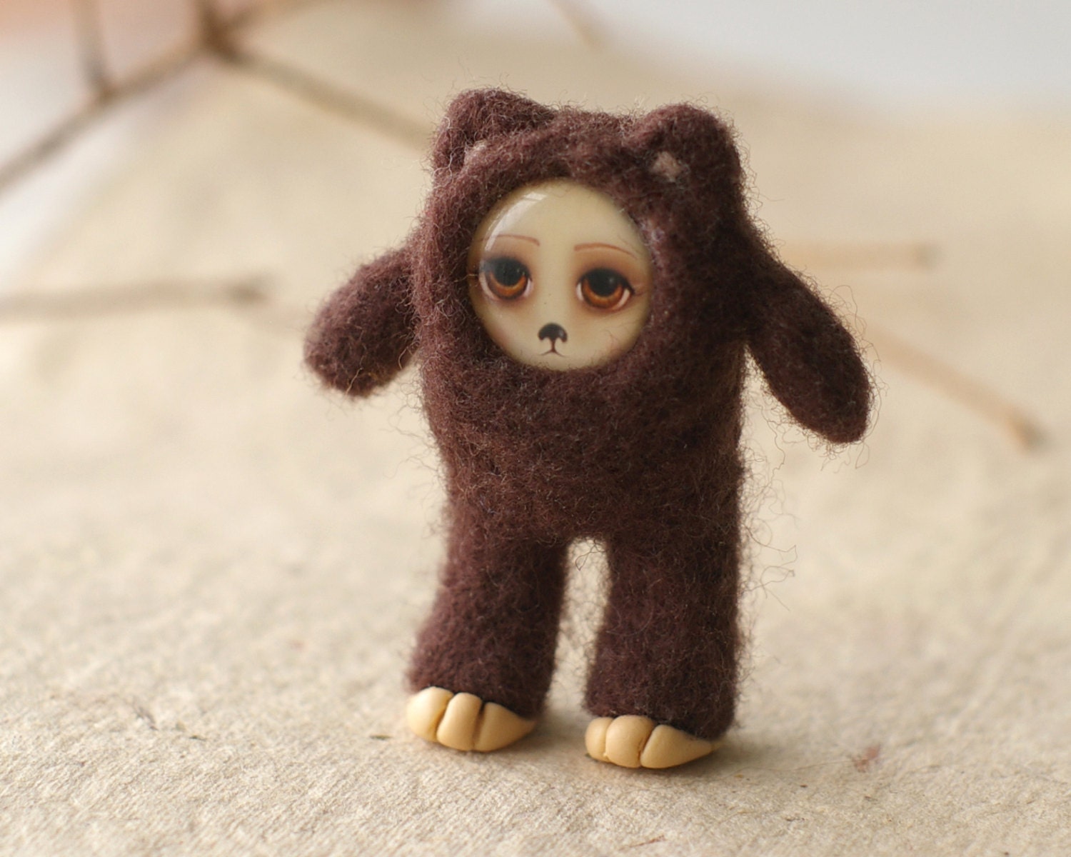 Felted Bear with drawn face - brown pocket bear - needle felted toy