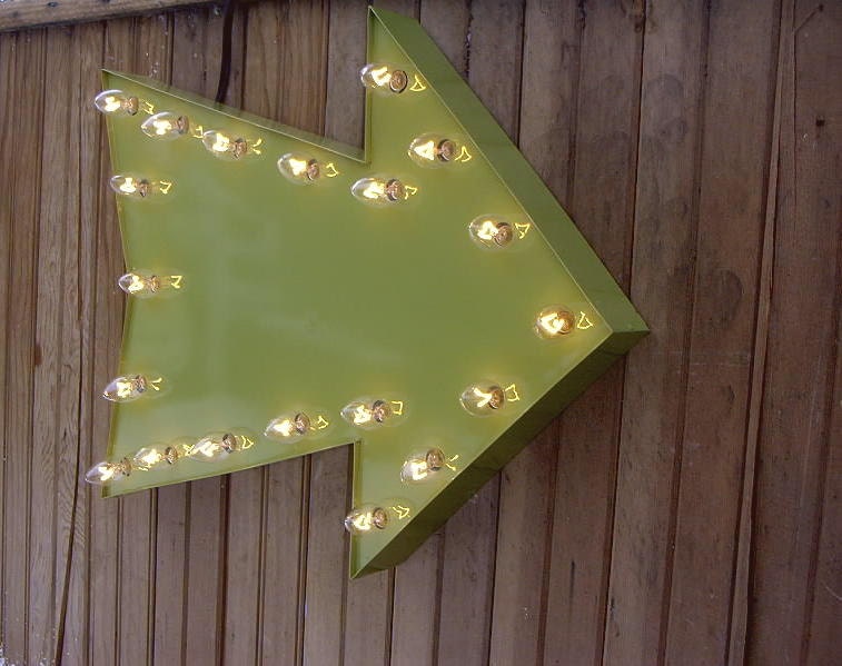 Green arrow light up wall sign