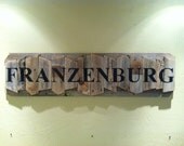 Personalized Family Name Sign on a rustic random wood canvas