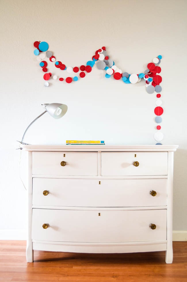 White hand painted dresser with gold accents and wallpaper insert