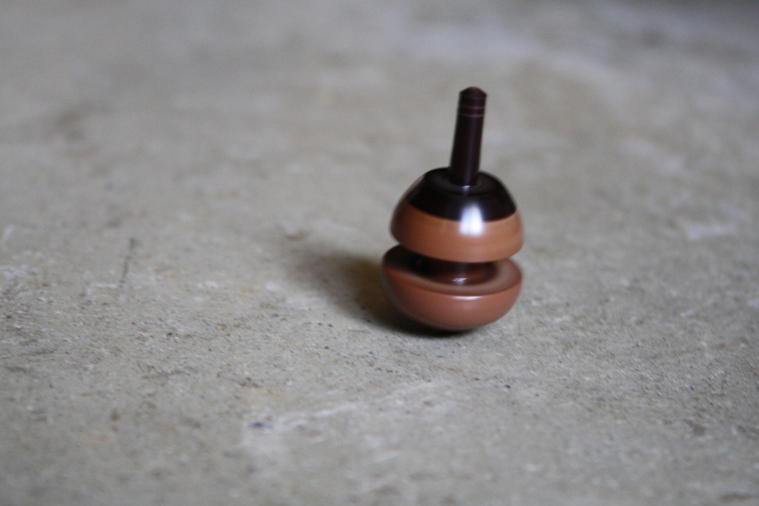 fancy hand carved wooden top.