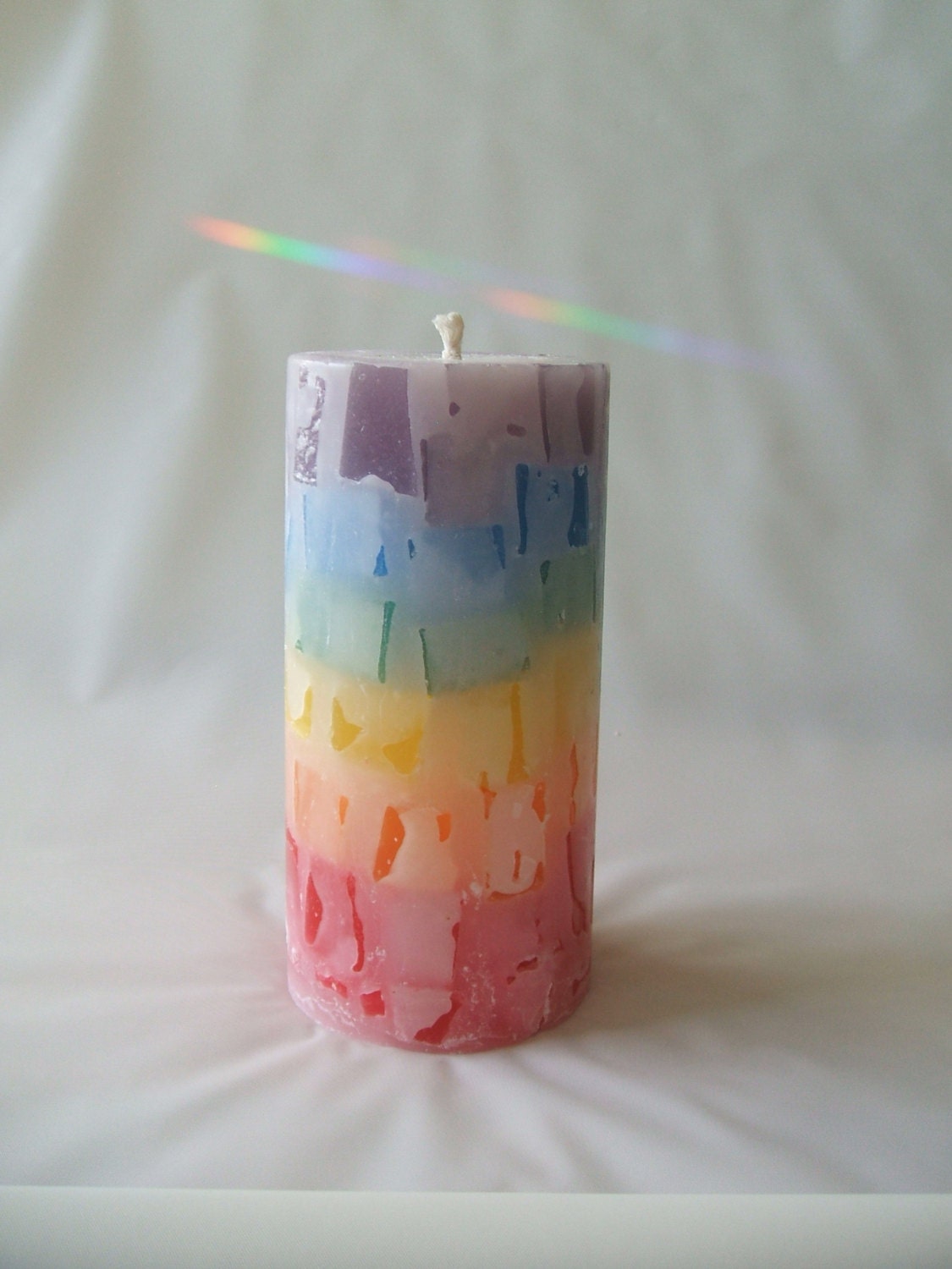 Rainbow In Reverse Pillar Candle in Pomegranate Scent
