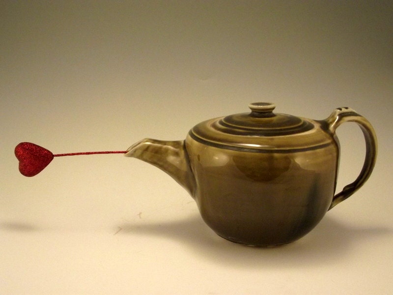 Diana's Obsession -  amber celadon, porcelain teapot with shiny green crackling glaze