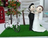 Wedding Cake topper, wedding clay couple in the woods with clay miniature bicycle, clay doll decoration, clay rings holder in wedding
