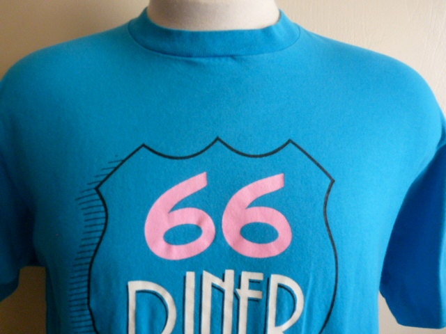 late 80's early 90's 66 DINER, Albuquerque souvenir t-shirt, hot pink black and white print on teal cotton shirt