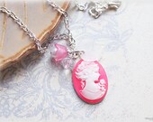 Cameo necklace - hot pink silhouette in silver tone setting lucite - vintage victorian style jewelry