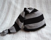Newborn boy hat. Gray and black stripes. Soft stretchy knit material. Size- newborn.   Made by lippybrand.
