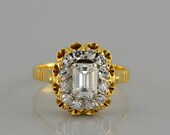 Spectacular Art Deco 1.50 Ct emerald cut diamond and more antique cluster ring