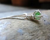 Green wire wrapped sea glass and sterling silver chain