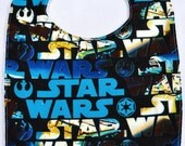 Star Wars Blue Logo Action Print Cotton Bib with White Terry Cloth - Geek-a-bye Baby -- Sci-Fi Geek - Handmade