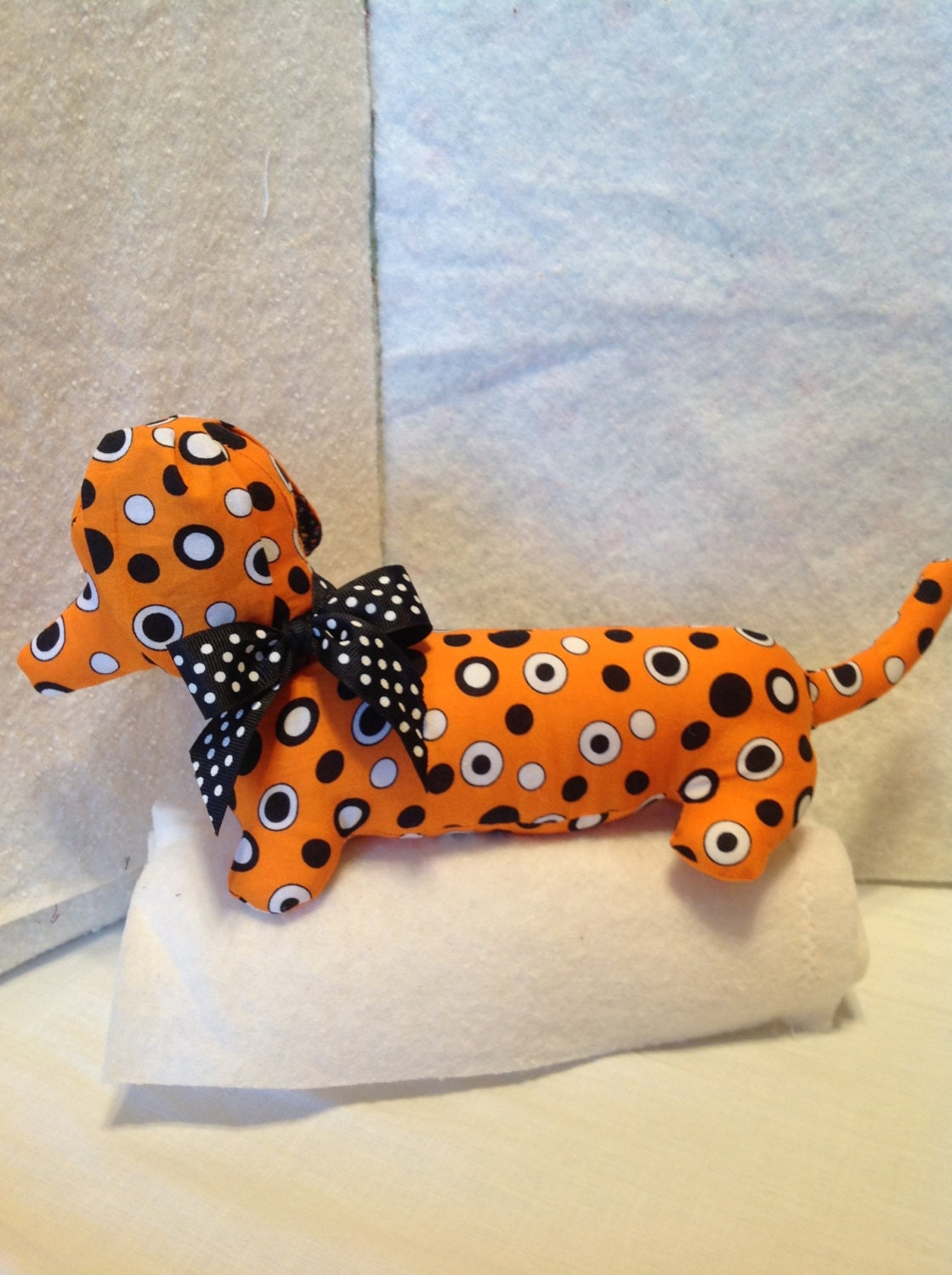 Dotty the orange polka-dot doxie doll