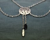 A Beautiful  necklace made with silver tone filigree and czech glass beads