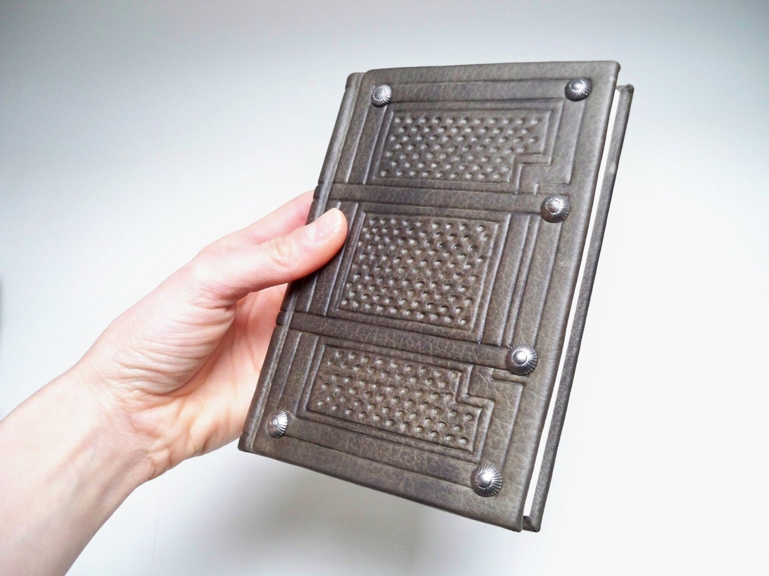 Grey Leather Book: Old Style Leather Binding, embossed tooled cover with studs.