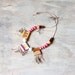 Joanna - Tribal statement necklace - Wood, feathers and leather