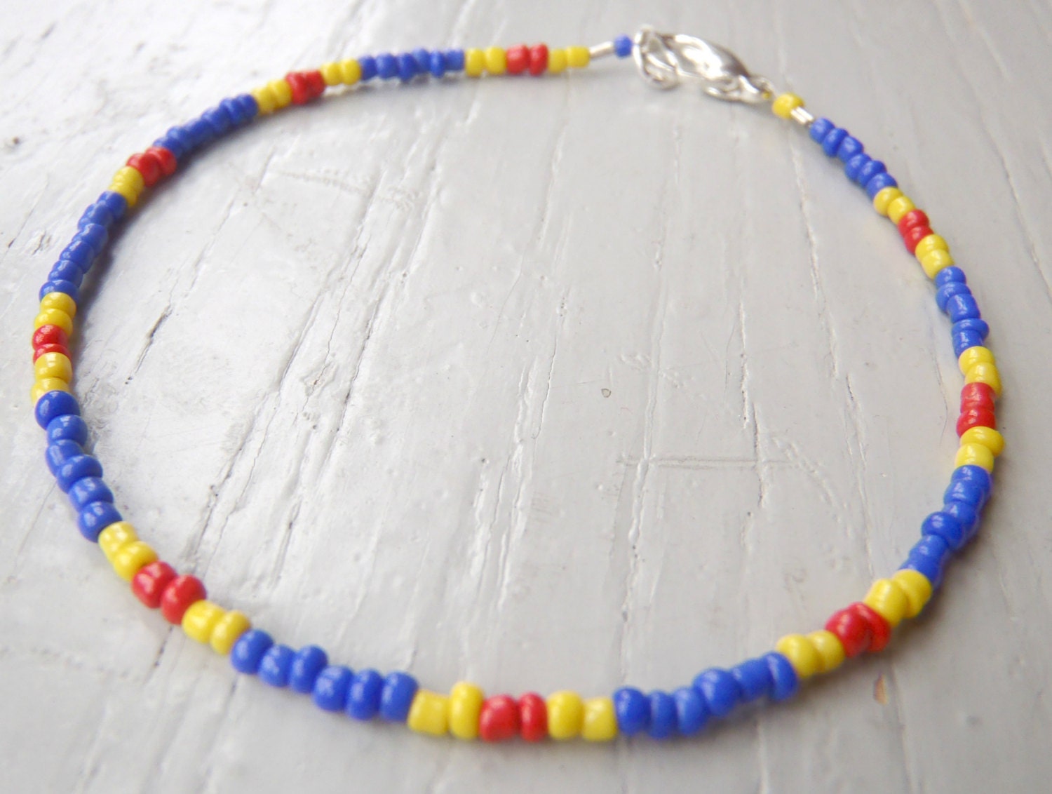 anklet in fun colours: electric blue, tomato red & yellow