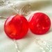 Small Reddish Orange Marbled Lucite Button Clip Earrings