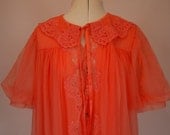 Vintage 1960s flouncy coral orange pink bri nylon and lace dressing gown with tie front by Kayser