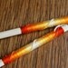 Hand decorated pair of long cooking bamboo chopsticks by Flower Power Nation
