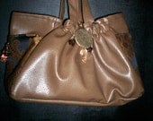 Brown faux leather with brocade print pockets
