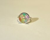 Colorful cyber ring with glitter and flakes in the color of the rainbow metal resin adjustable