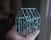 Miniature architectural framework house in pale blue stained birch