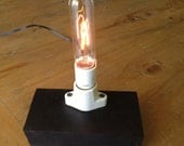 Minimalist Table Lamp with dimmer.  Solid Rubber base, ceramic socket & tube blub.