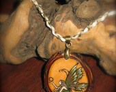 Faerie Pendant hand painted on a wood slice, collected in the beautiful Rocky Mountains