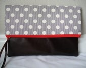 Polka dot fold-over zippered clutch with bright red zipper