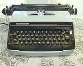 Working Electric Portable Typewriter. Smith Corona Super Correct. Black Keyboard with Gray Casing.