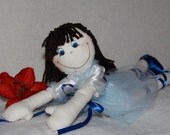 Dancy Blue is a unique blue ballerina rag doll, handmade and crafted with soft and cute fabrics.