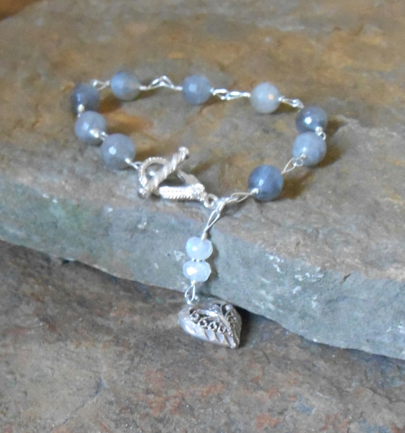 Sterling silver bracelet wre wrapped with labradorite gemstones and rainbow moonstone dangle with sterling silver heart