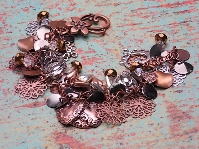 Mixed metal Charm bracelet, Bronze and silver colors, various heart charms, bronze & silver chips on a bronze chain w/ a bronze toggle clasp