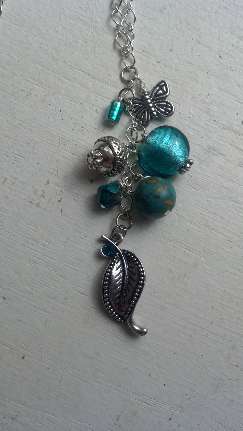 Handmade Inspirational Summer and Spring Trendy Teal Turquoise and Silver Dangle Bead Necklace with Butterfly and Pretty Leaf Accent Charms