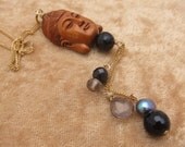 Rosa: Wood Buddah with Lapiz Lazuli and Pearl