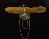 A unique, one of a kind, quality wire wrapped, aqua blue beach glass pendant with sterling silver chain. Free Shipping.