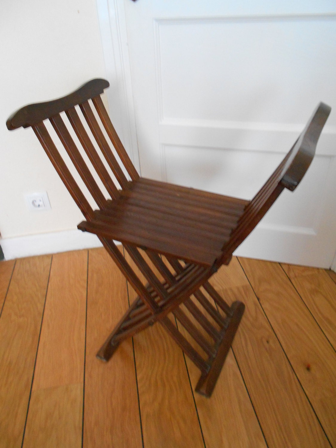Antique wood retro and vintage handmade folding chair in the 40s