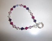 Handmade 8" silver pink, purple white crystal wtih silver bead bracelet is both beautiful and unique